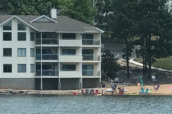 Our condo is second one directly behind this first building next to the beach