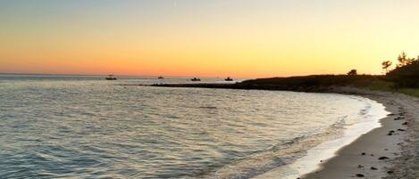 On the beach, sun-loungers, beach towels