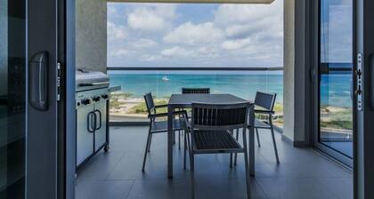 Aruba Luxury Beach Oceanfront Residence at Azure steps to Eagle and Palm Beach
