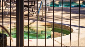 A swimming pool with a sign indicating no swimming at all times. - SLEEPS 6 Beautiful, Fully Furnished Condo - Great Price, Perfect Location! (Tempe)
