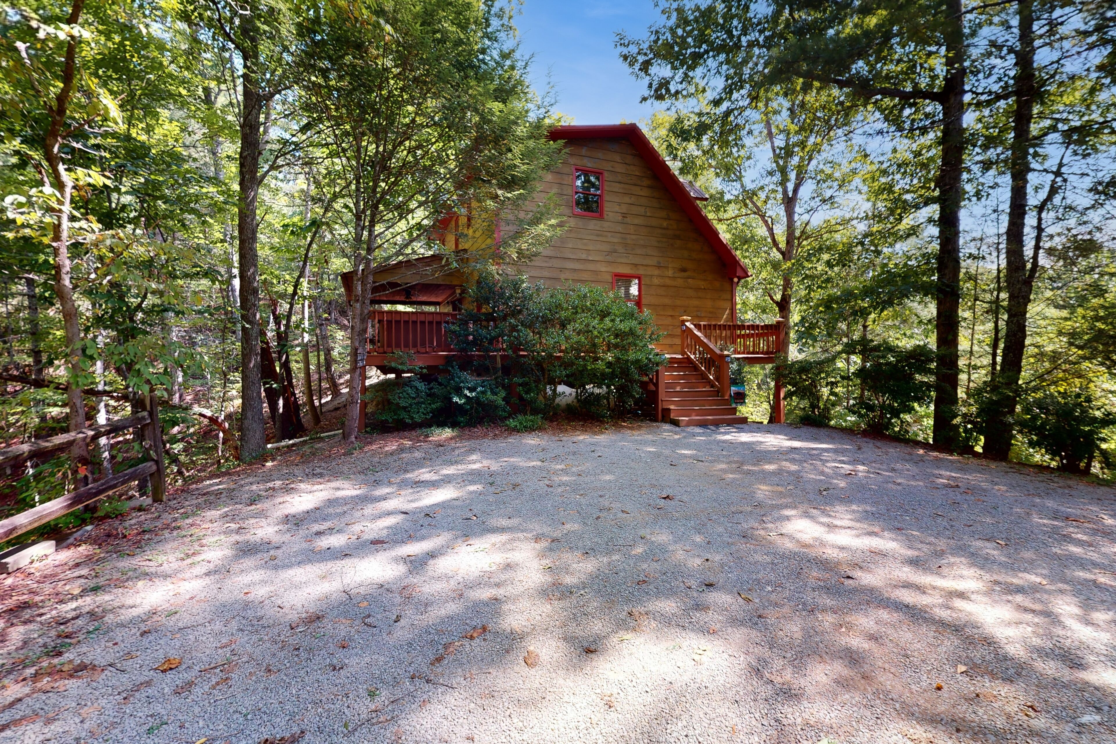 Woodland home with a private hot tub, large deck, & pool table