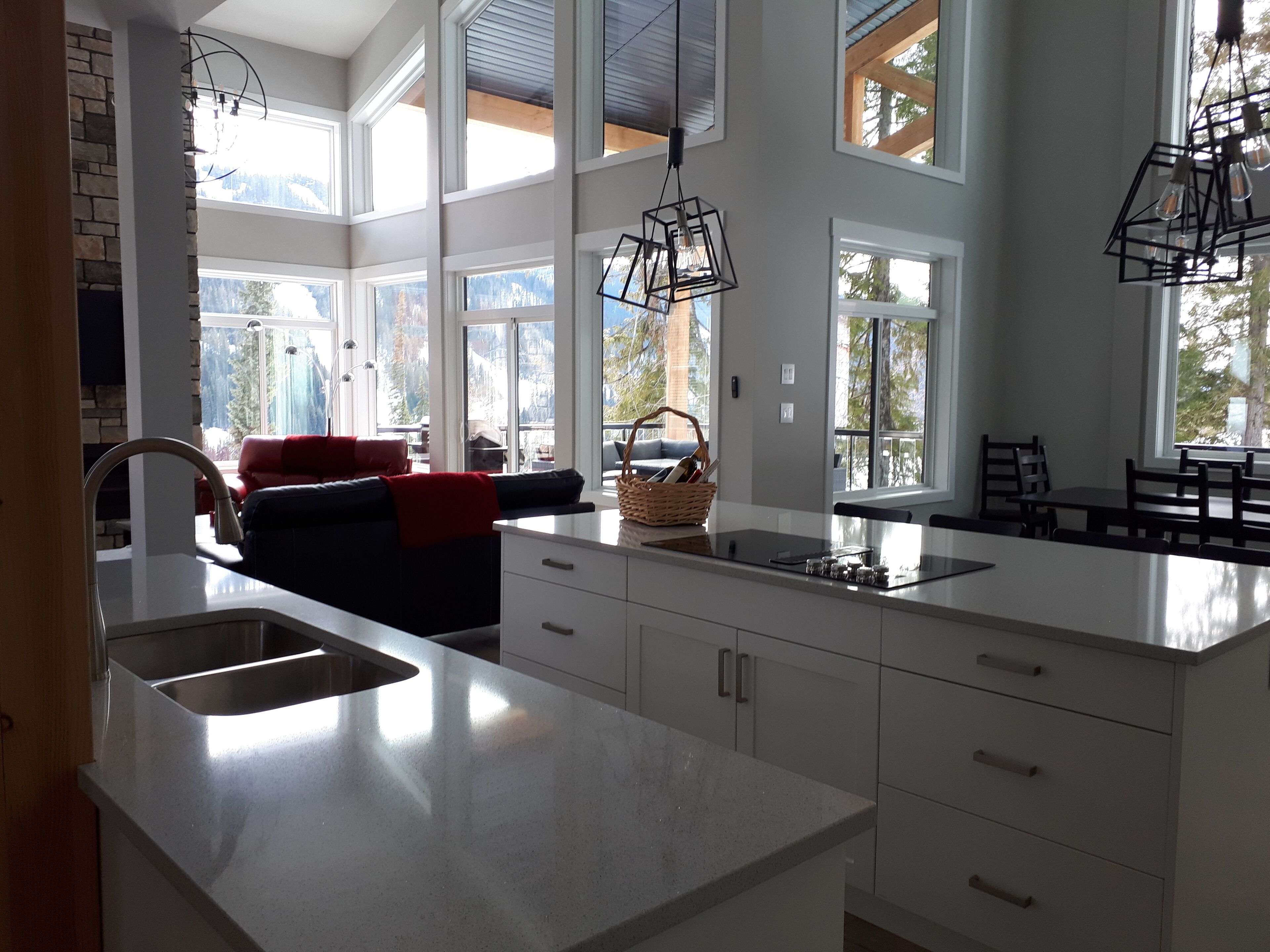 Double islands in kitchen with Quartz counters