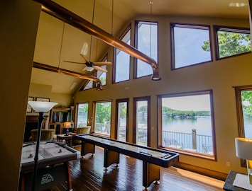 Game Room with Amazing Lake views. Shuffleboard, Air-Hockey, Darts and Foosball