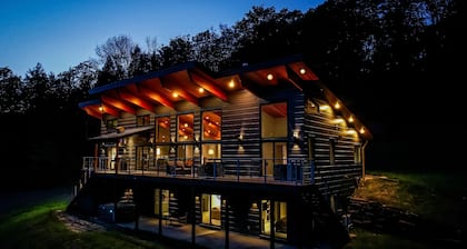 Luxury home w/ two master suites, hot tub, spectacular views, 13 private acres