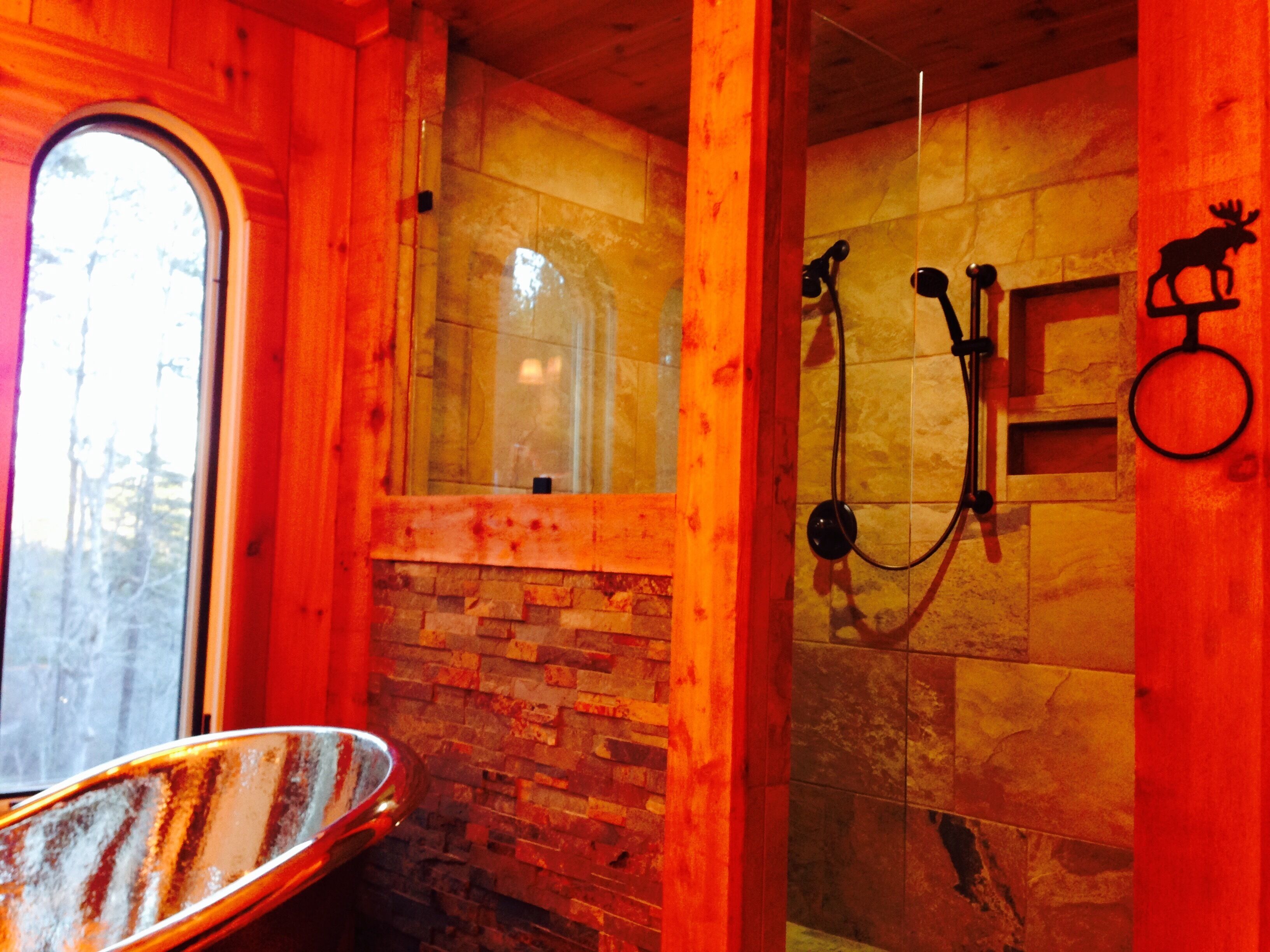 Combined shower/tub, hair dryer, towels, toilet paper