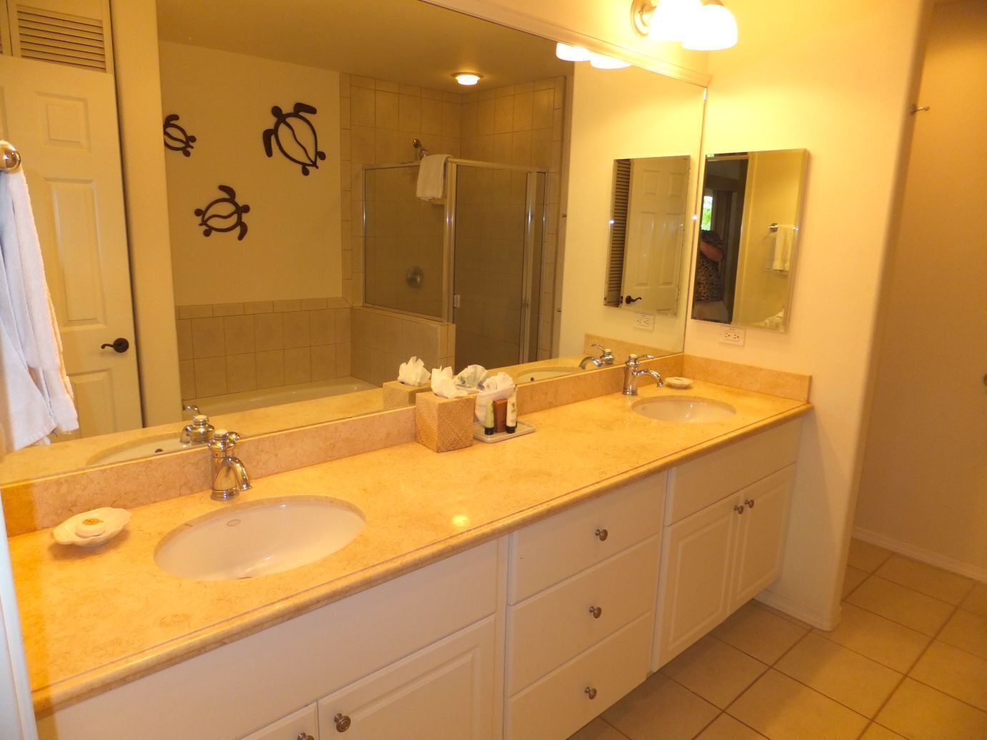 Combined shower/tub, hair dryer, towels, soap