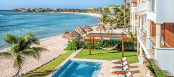 Luxurious and elegant beachfront villa with a heated pool!