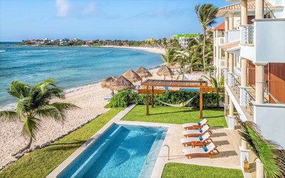 Luxurious and elegant beachfront villa with a heated pool!