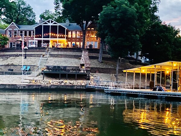 Enjoy scenic views from the spacious balcony area overlooking the lake.