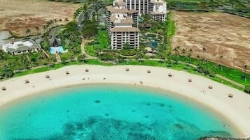 On the beach, sun loungers, beach towels