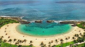 On the beach, sun-loungers, beach towels