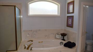 Jetted bath, hair dryer, towels, soap