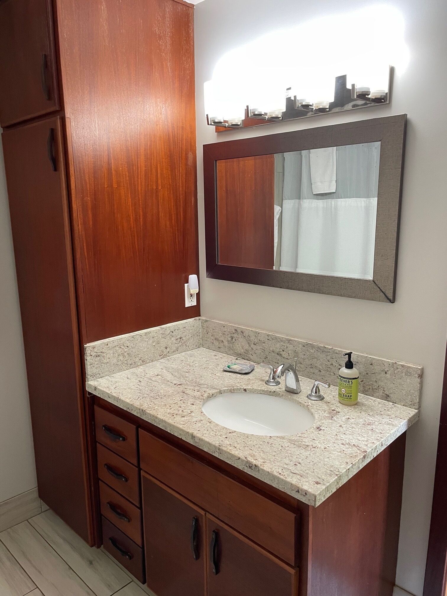 Combined shower/tub, hair dryer, towels, soap