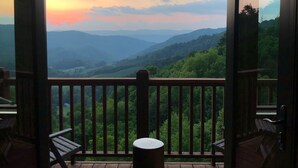 A room with a wooden deck and a view of a mountainous landscape. - Incredible Mtn Views - 106 Acres: Private Pool, Pickleball Fall of 2026 (Zionville)