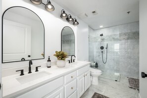 Bathtub, hair dryer, towels