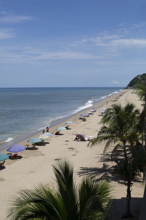 On the beach, sun loungers, beach towels