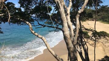 On the beach, sun loungers, beach towels