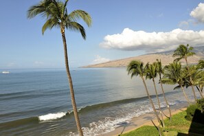 On the beach, sun loungers, beach towels - Oceanfront Sugar Beach 525 Tropical Condo, on the Beach, (Kihei)
