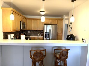 Coffee/tea maker, fridge, microwave, oven