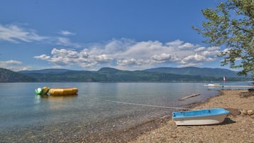 On the beach, sun-loungers