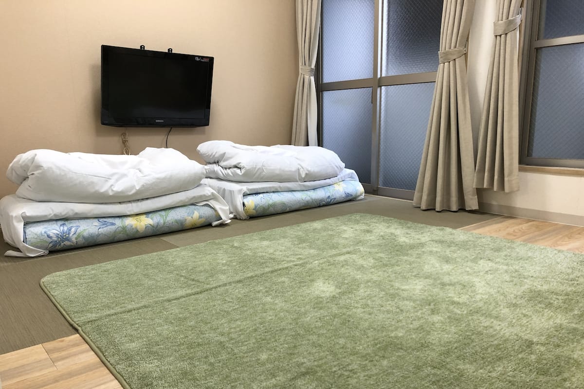 Habitación familiar | Wifi gratis y ropa de cama