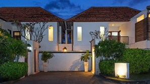 Room, Multiple Beds (Echo Beach Villa) | Front of property - evening/night