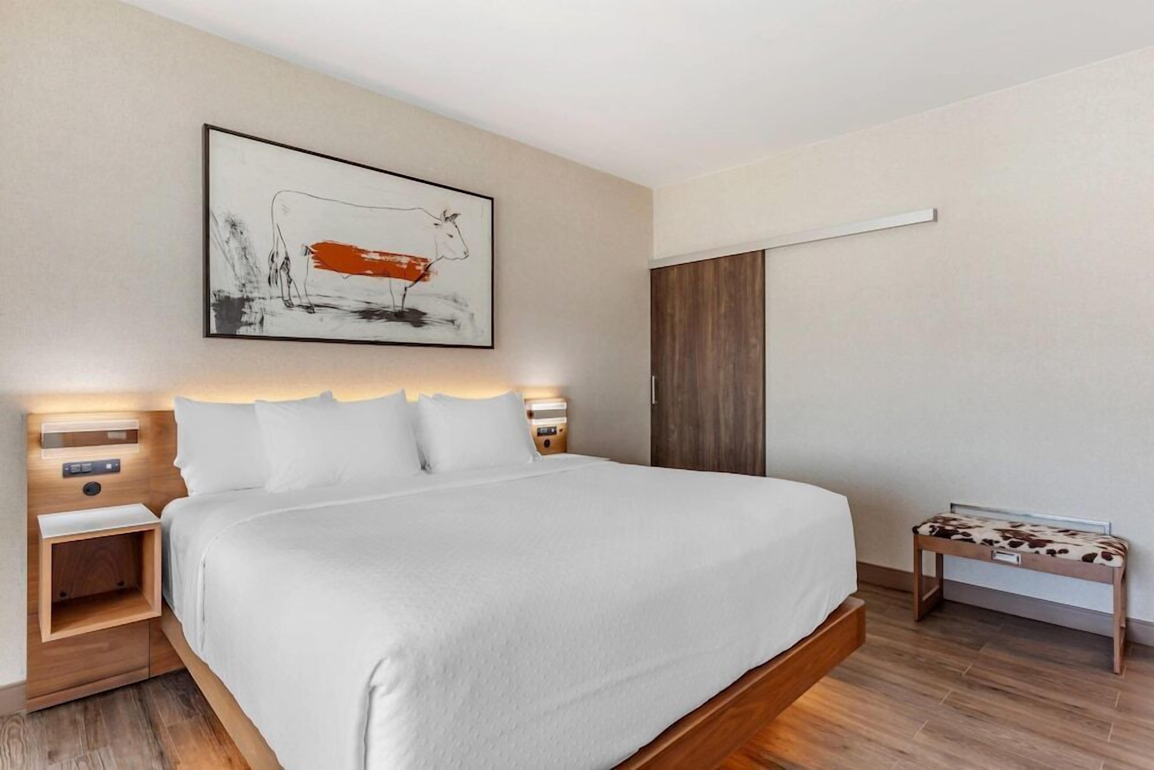 Premium bedding, down comforters, pillowtop beds, desk