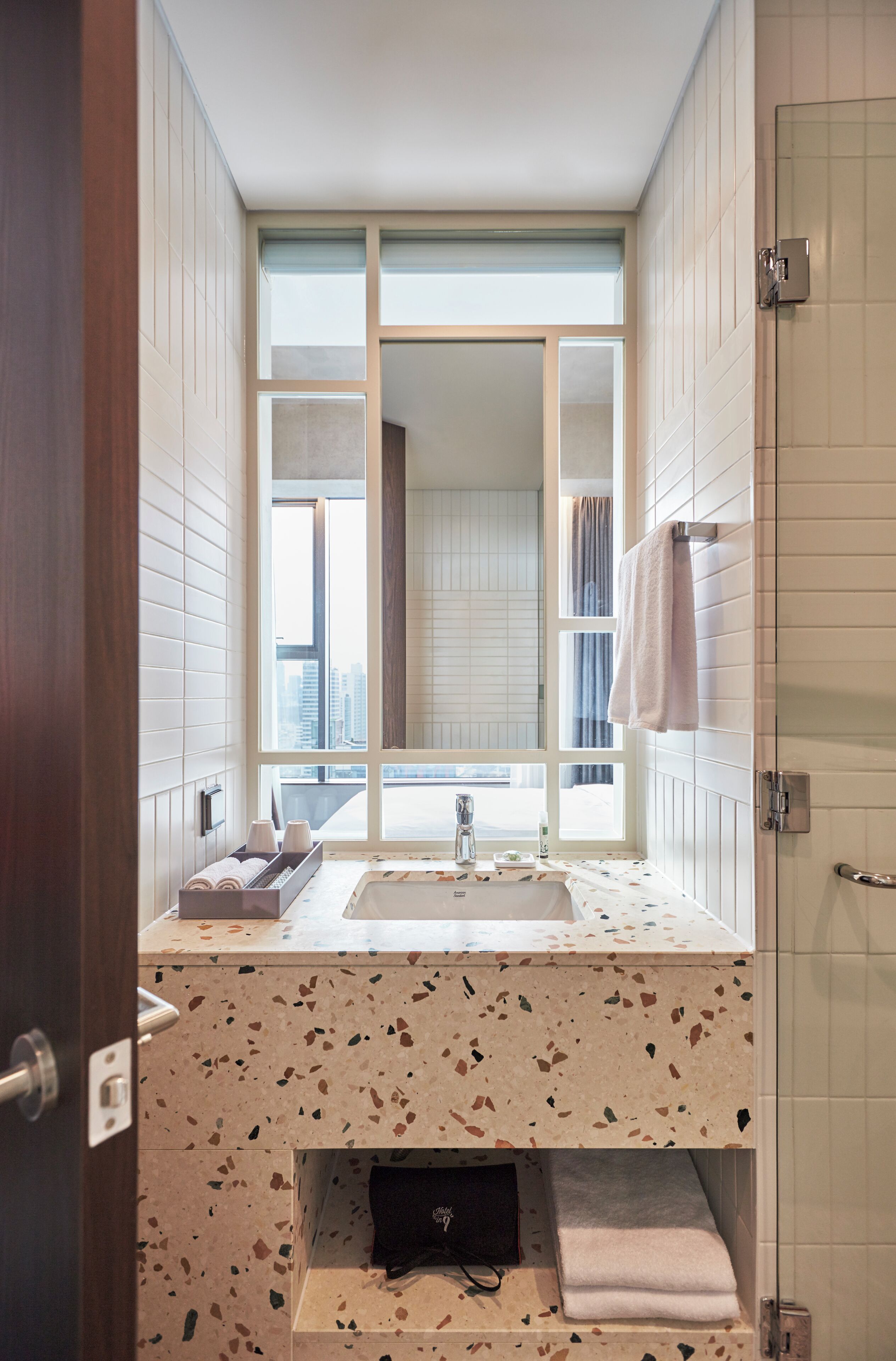 shower, hair dryer, bathrobes, slippers