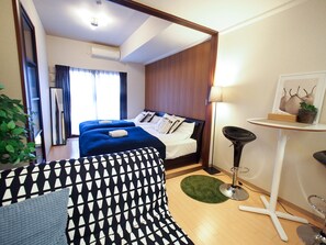 Apartment | Living area | Flat-screen TV - Family Stay DOTONBORI III PH74 (Osaka)