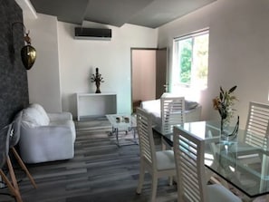 Comfort Apartment, Multiple Beds, Hot Tub | Living area | Smart TV