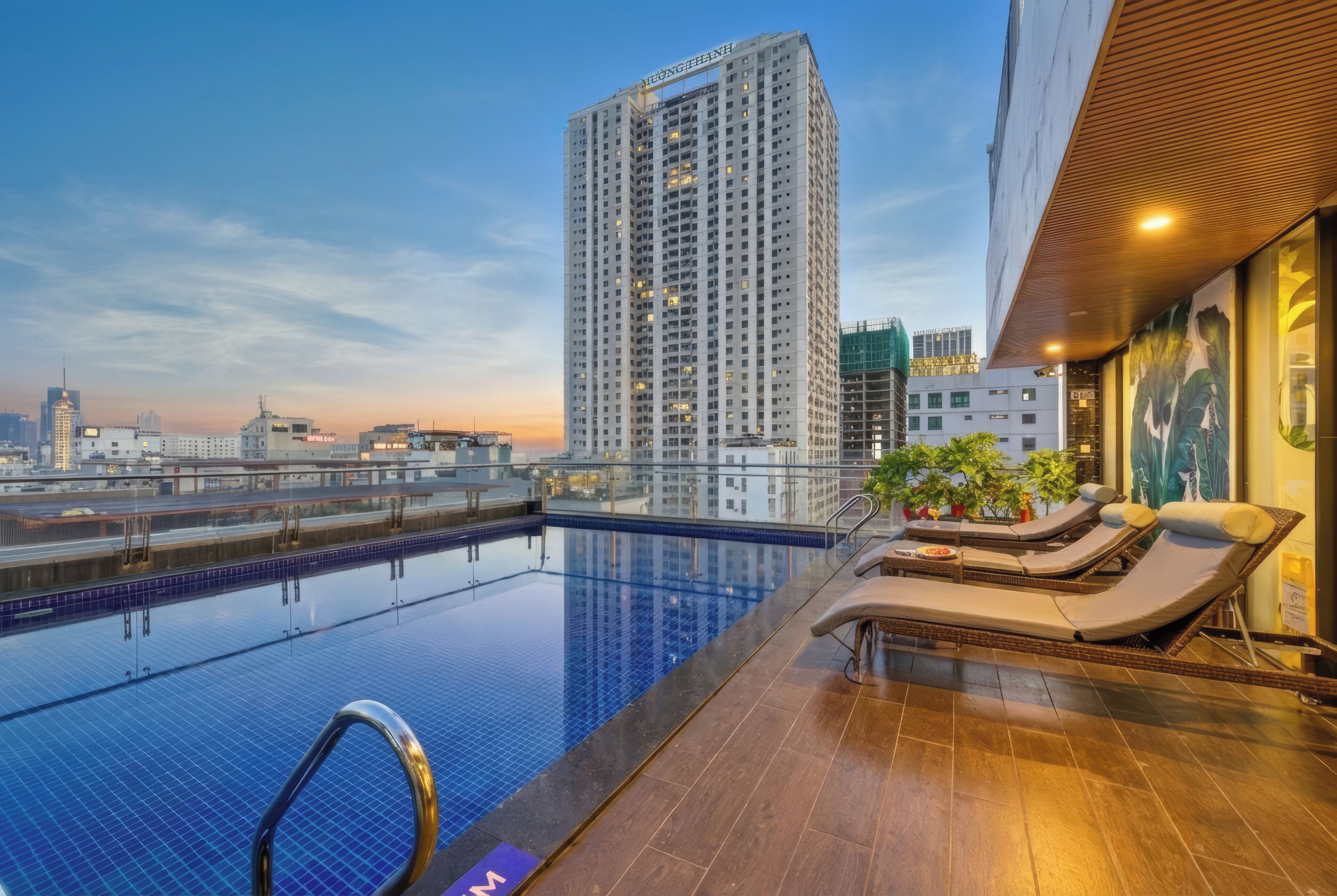 Outdoor pool, open 6:00 AM to 7:00 PM, pool umbrellas, pool loungers