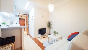 Apartemen | Ruang keluarga | TV layar datar