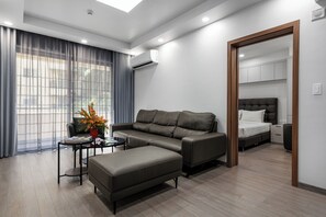 Premier Apartment, 2 Bedrooms | Living area | Flat-screen TV - Sunflower International Village (Hai Phong)