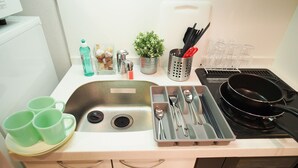 Apartment | Private kitchenette | Fridge, microwave, stovetop, electric kettle - Namba Inn PH190 (Osaka)