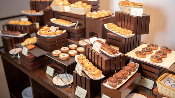 A buffet with various baked goods and pastries. - Galway Heights Hotel (Nuwara Eliya)