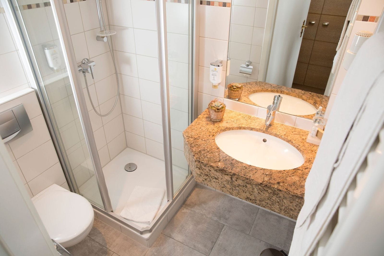 free toiletries, hair dryer, slippers, bidet