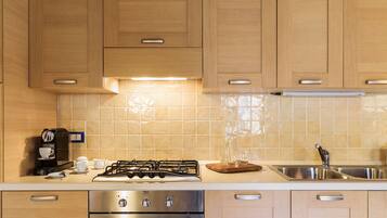 Apartment, 2 Bedrooms | Private kitchen | Fridge, oven, stovetop, dishwasher