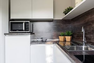 Apartment, 1 Bedroom | Private kitchen | Fridge, microwave, oven, stovetop