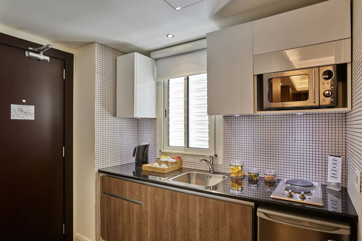 Premium Room with Balcony | 1 bedroom, down comforters, minibar, in-room safe