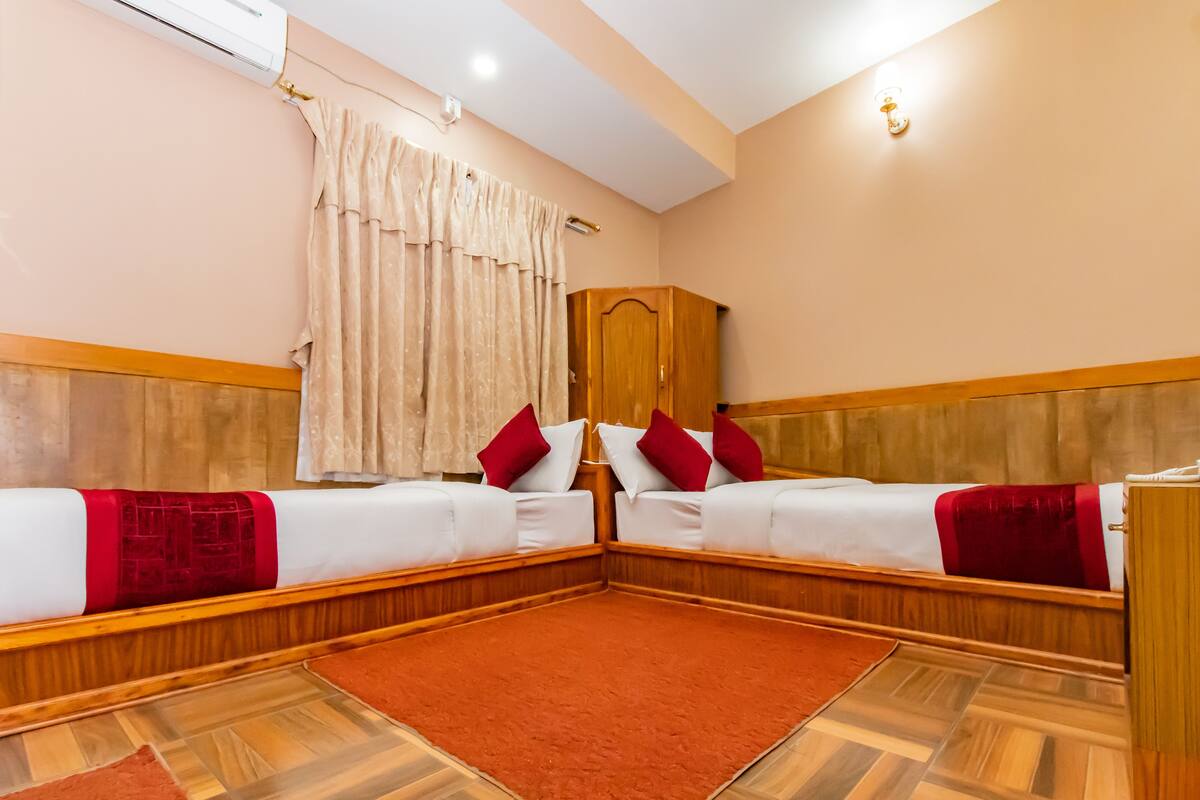 Chambre familiale avec lits jumeaux, 2 lits jumeaux, fumeur | 1 chambre, literie hypoallergénique, rideaux d’obscurcissement