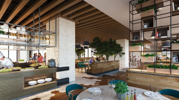 Un interior de restaurante moderno con un chef preparando comida, una zona de buffet y un área de comedor con mesas dispuestas.
