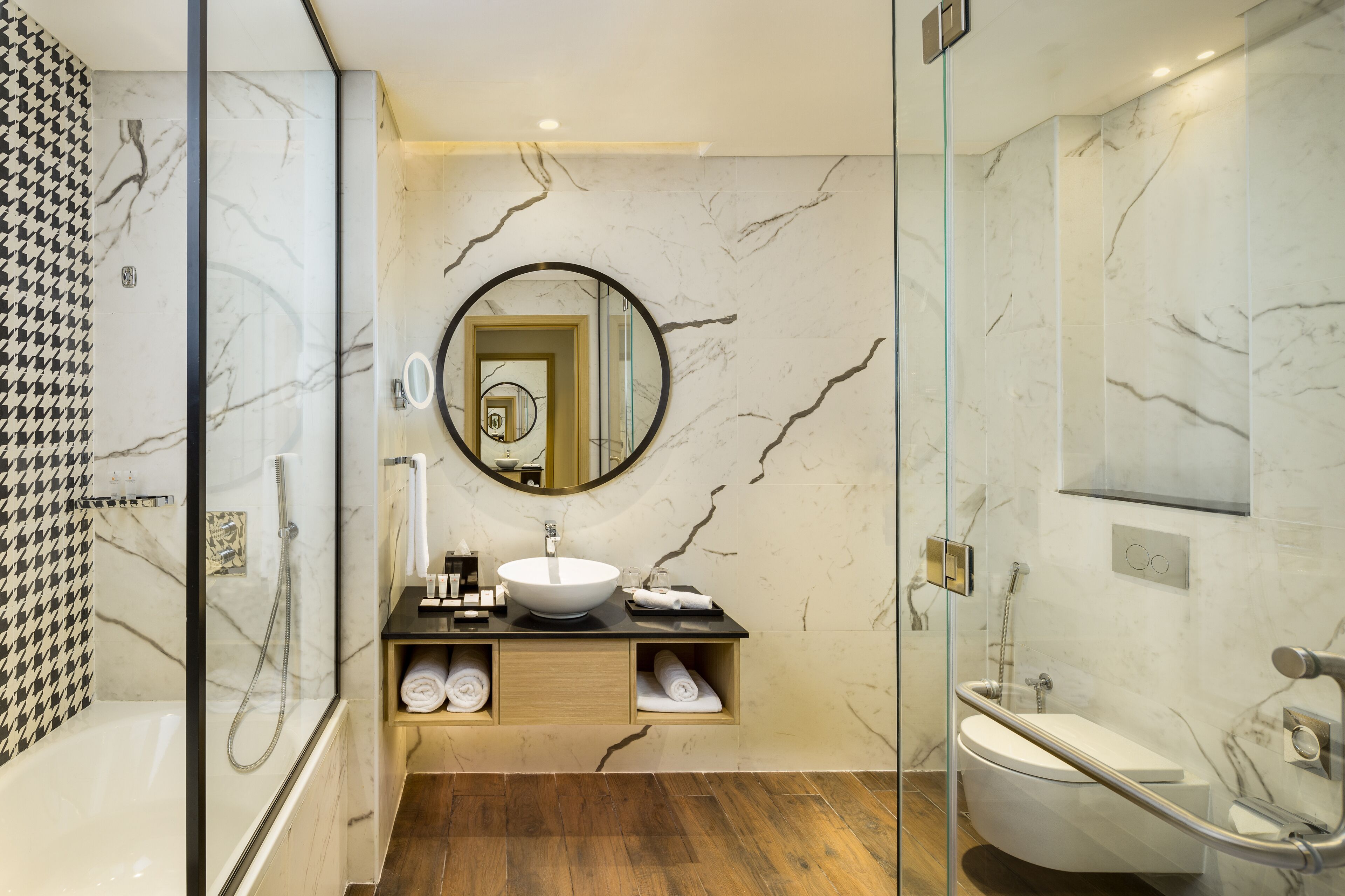 rainfall showerhead, eco-friendly toiletries, bathrobes, towels