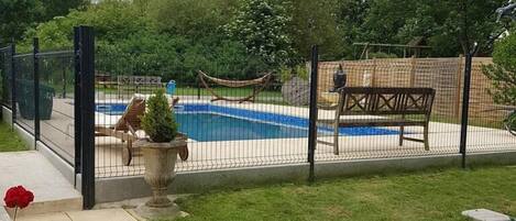 Seasonal outdoor pool, pool umbrellas, sun loungers