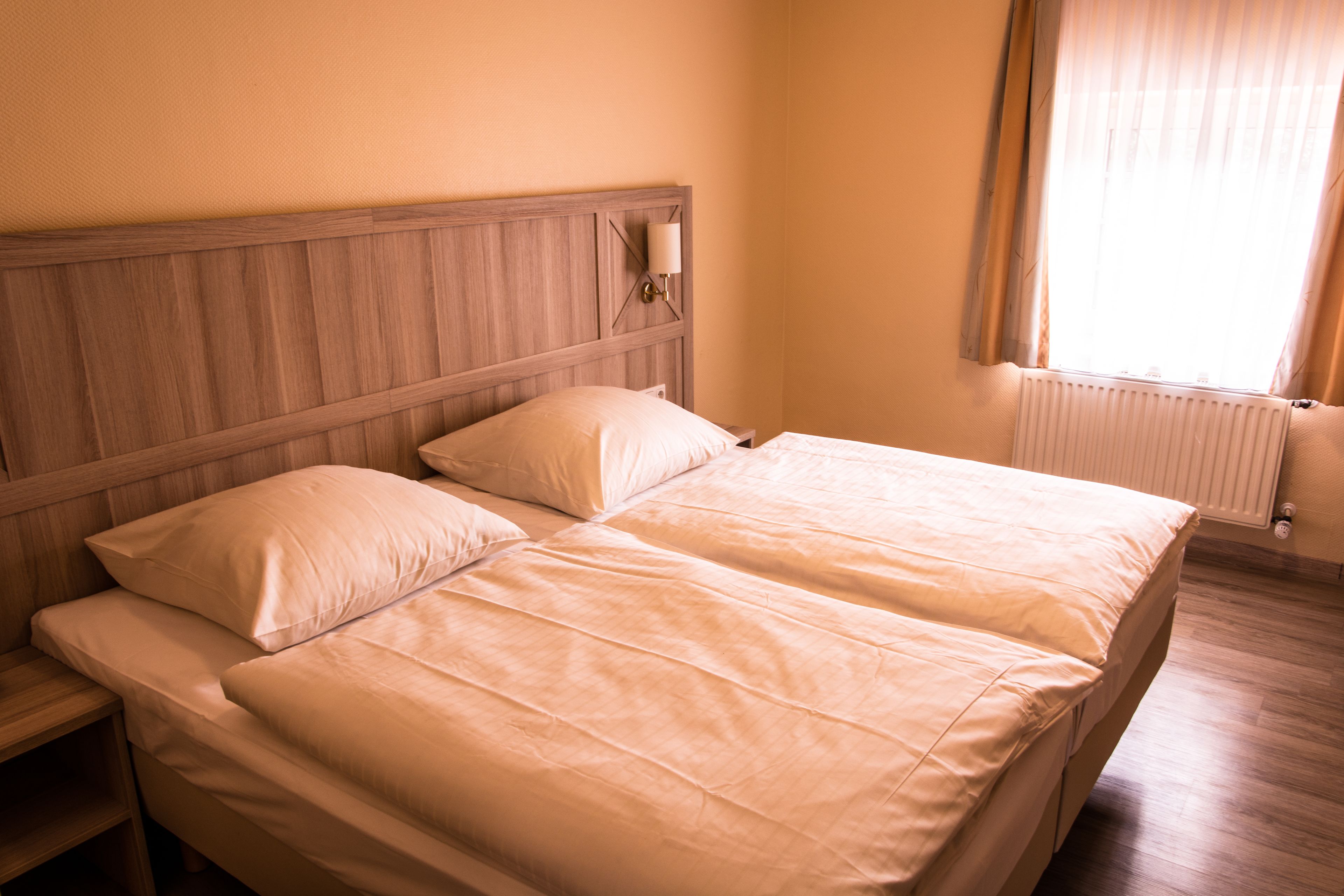 hypo-allergenic bedding, desk, blackout curtains, cots/infant beds