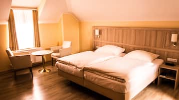 Hypo-allergenic bedding, desk, blackout curtains, cots/infant beds