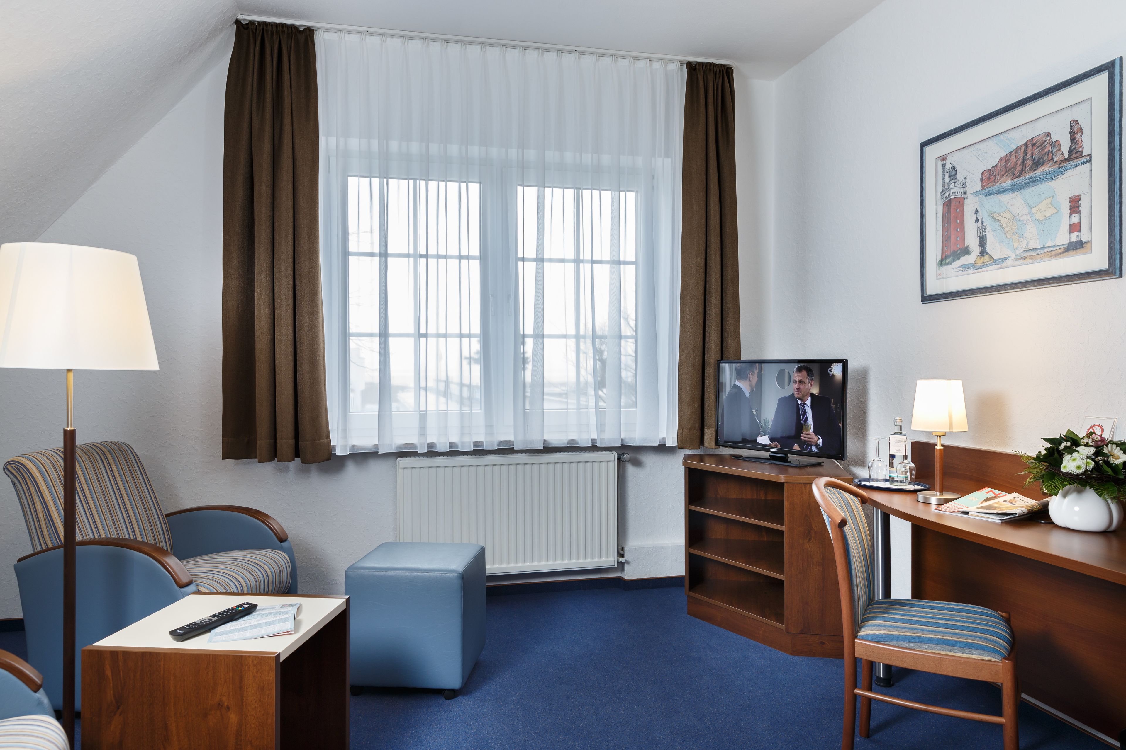 double room (nordsee) | living area | flat-screen tv