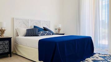 Roupas de cama premium, edredons de pluma, cofres nos quartos