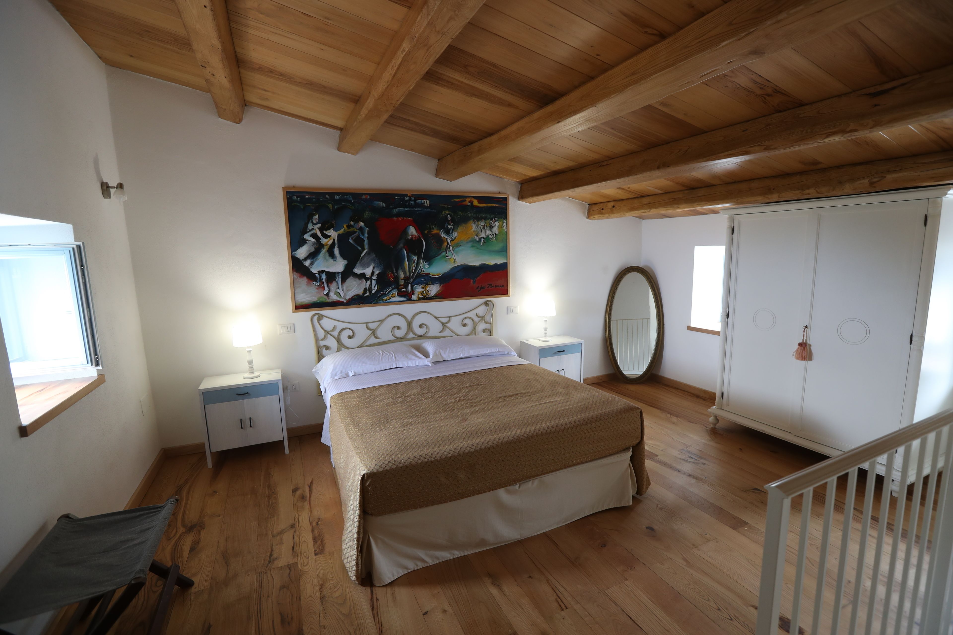 Suite, vista giardino | Minibar, una cassaforte in camera, con stile personalizzato