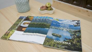 A brochure for Slovenia with a scenic view of a lake and mountains.