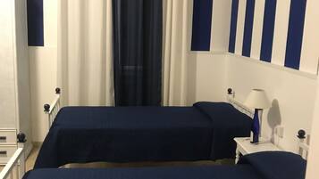 Camera Quadrupla, vista giardino | Hochwertige Bettwaren, individuell dekoriert, Verdunkelungsvorhänge